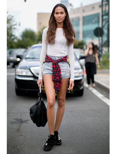 the gorgeous joansmalls gets her grunge on in denim shorts and a flannel tied around her waist