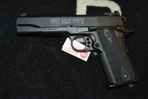 It feels wrong that it's down here. Colt 1911 Gold Cup Trophy .22lr 5in Barrel 12rd Mag Nib For Sale at GunAuction.com - 11955524