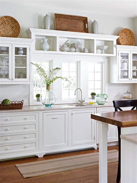 Many kitchen cabinets reach the ceiling, but not all of them do. 10 Stylish Ideas for Decorating Above Kitchen Cabinets