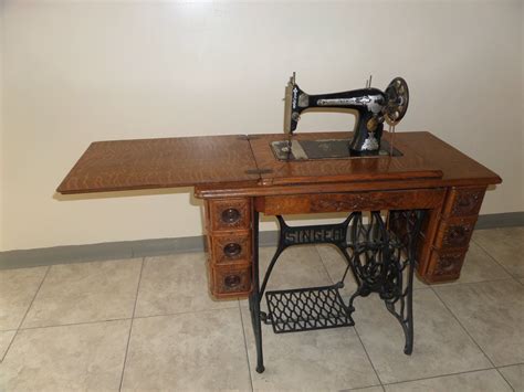 Some vintage and antique sewing machines have value to collectors. Treadle Sewing Machine Cabinet | BloggerLuv.com