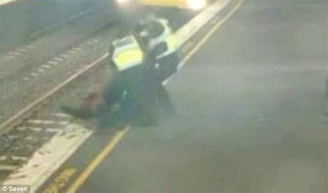 Melbourne Staff Pull Drunken Woman Off Train Tracks Daily Mail Online