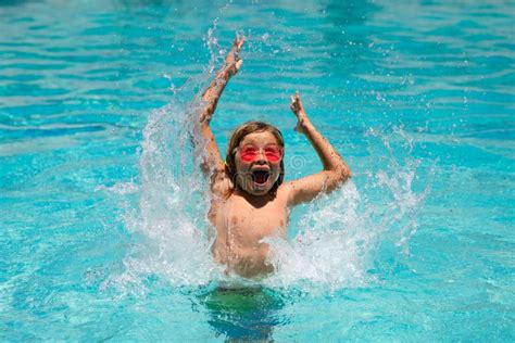 Young Boy Swim In Pool Child Boy Rest In Swimming Pool Stock Photo