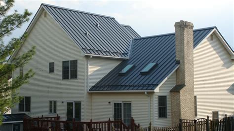 Custom Grey Standing Seam Metal Roof With Snow Guards Installation In