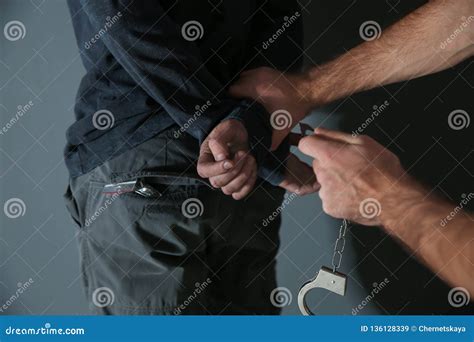 Man Putting Handcuffs On Drug Dealer Stock Image Image Of Adult Illegal
