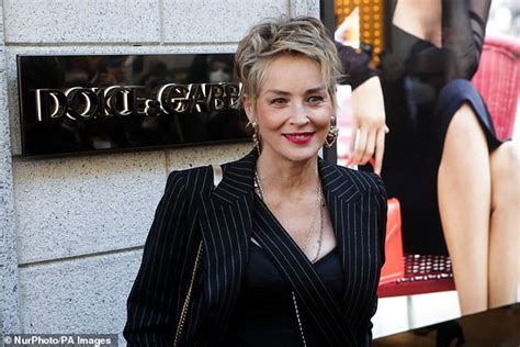 Sharon Stone 63 Looks Chic In A Plunging Black Trouser Suit At Dolce