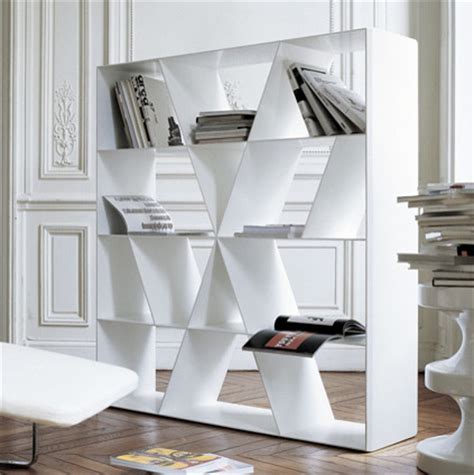 If you're looking for a way to divide out a room while having storage for small items and aren't necessarily trying to create they used uniquely designed bookcases as a way to put space between the entryway and the sitting area. Open Bookcase Room Divider Ideas - HomesFeed
