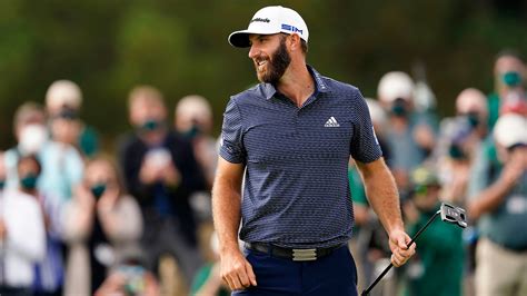 Dustin Johnson Celebrates Winning On The No 18 Green During Round 4 Of