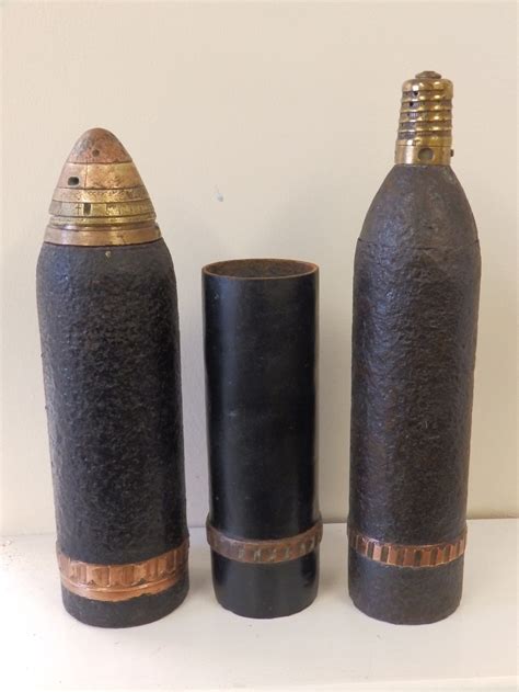 A Wwi French 75mm Shrapnel Shell With Beehive Fuse A