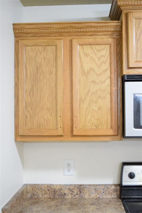 How To Refinish Wood Cabinets The Easy Way Stained Kitchen Cabinets