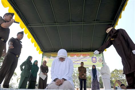 indonesian is whipped 100 times for sex outside marriage daily mail online
