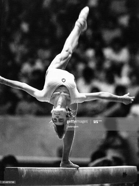 1961) is one of the most famous and accomplished gymnasts of all time. Romanian gymnast Nadia Comaneci performs on the balance ...