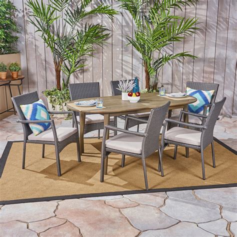 Jaxson Outdoor 7 Piece Acacia Wood Dining Set With Wicker Chairs And