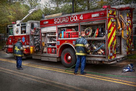 Firemen The Modern Fire Truck Photograph By Mike Savad Pixels