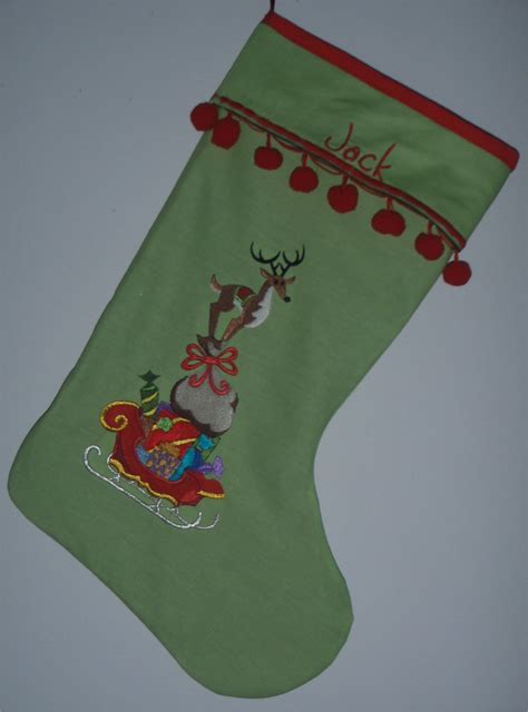 201654 christmas stocking machine embroidered reindeer stack personalised red bobble trim