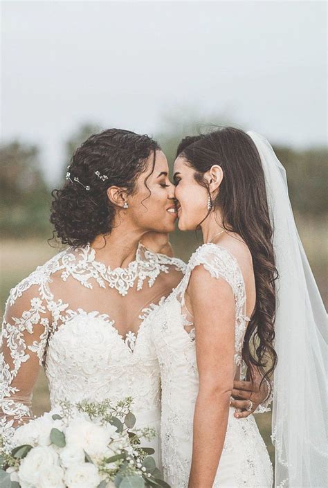 romantic wedding photo lesbian wedding photography kiss a winery wedding with a modern