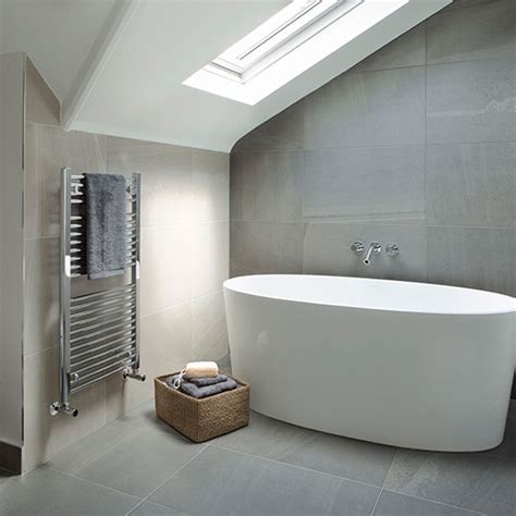Giving your family bathroom, wetroom or ensuite a makeover is easy, simply sit back, relax and peruse our tile selection, pick your favourite and get beautiful tiles delivered to your door. Grey and cream tiled modern bathroom | Decorating | Ideal Home