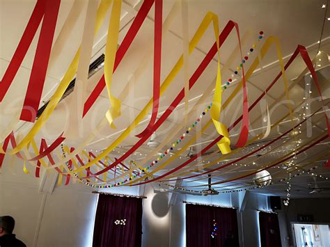 Also, you can use them to provide a stunning backdrop to your wedding photoshoot. Ribbon Canopies - Ceiling Decorations - So Lets Party