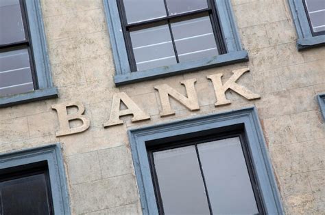Premium Photo Closeup Of Bank Sign On Building