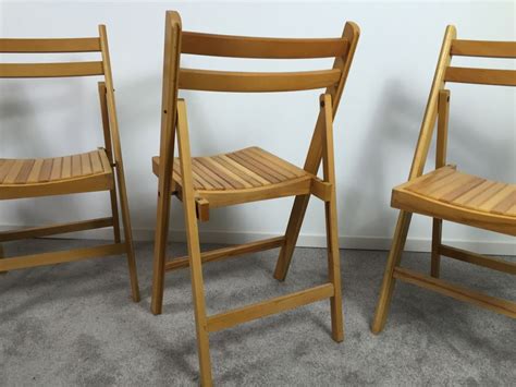And don't forget about color, ranging from white to black and everything in between. Set Of Four Wooden Folding Chairs Made In Romania