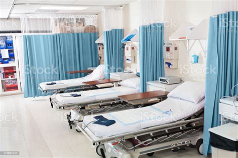 Empty Beds Ready For Patients In Hospital Surgery Recovery Room Stock