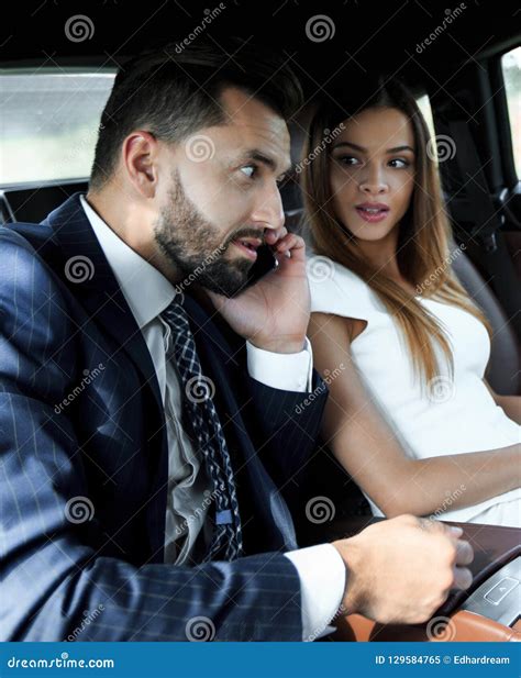 Excited Business Coworker In Back Seat Of Car Stock Image Image Of