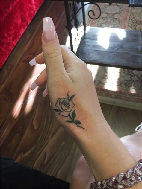 This flower tattoo design on hand is made more beautiful by the bee on it. MUST READ: Hand Tattoos For Women - Get Your Cool Ideas ...