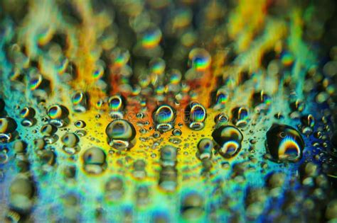 Abstract Art With Water Droplets On A Colorful Surface Stock Photo