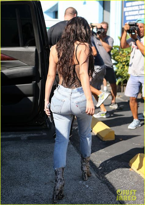 Kim Kardashian Wears Lace Corset And Jeans For Miami Outing Photo