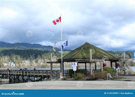 Canadian Flag And The Pier In Port Moody British Columbia Editorial