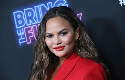 Chrissy Teigen Reveals That She Wants To Remove Breast Implants That