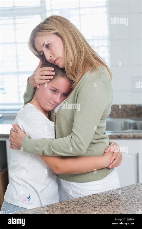 Sad Little Girl Hugging Her Mother Stock Photo 80004460 Alamy