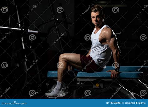 Male Resting On Bench In Fitness Center Stock Photo Image Of Model