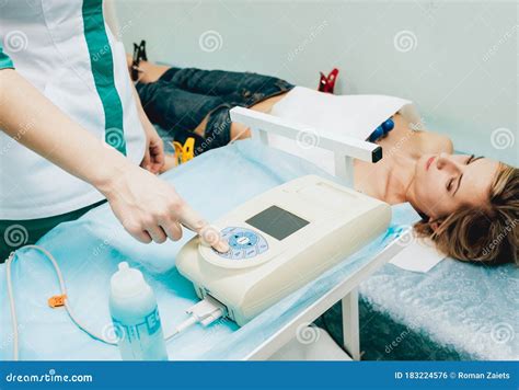 Doctor With Electrocardiogram Equipment Making Cardiogram Test Stock