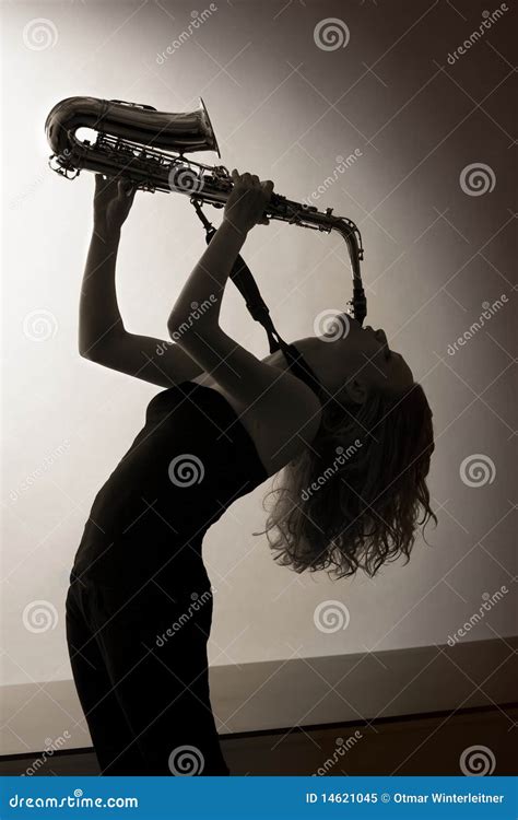 portrait of woman playing saxophone sepia toned stock image image of adult perform 14621045