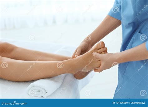Woman Receiving Leg Massage In Wellness Center Stock Photo Image Of