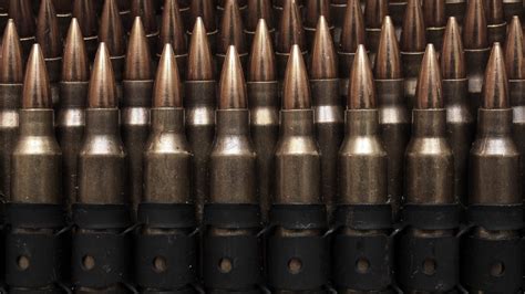 Brass Colored Gun Bullet Lot Ammunition Weapon Bullet Hd Wallpaper