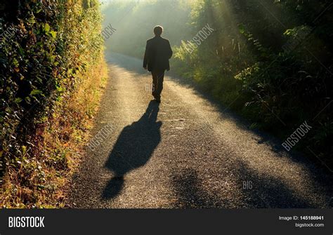 Alone Man Walking Image And Photo Free Trial Bigstock
