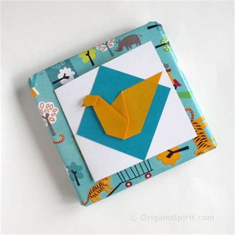 Using designer paper with a direction doesn't mean you have to discard the other piece. Fold the Perfect Origami Bird for Greeting Cards!