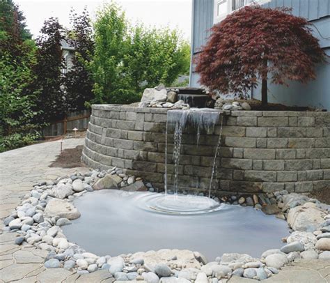 A retaining wall is designed to hold back earth and create flat yard space. Hardscapes and Patios Add to Pond Beauty - POND Trade Magazine