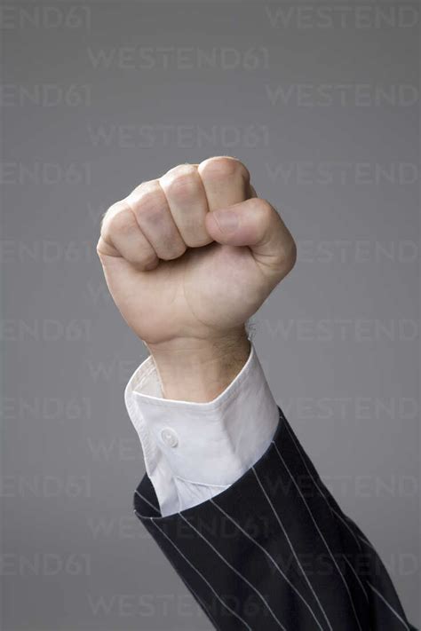 Man Making Hand Gesture Fist Close Up Stock Photo