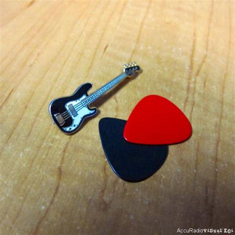 This Must Be The Worlds Smallest Guitar Even The Picks Are Bigger