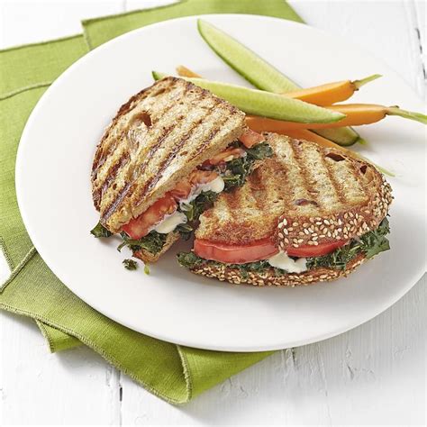 Place cheese, grilled mushrooms and onions, fresh spinach, tomatoes, and avocado on the bread. 407 caloriesThis vegetarian panini recipe—filled with ...