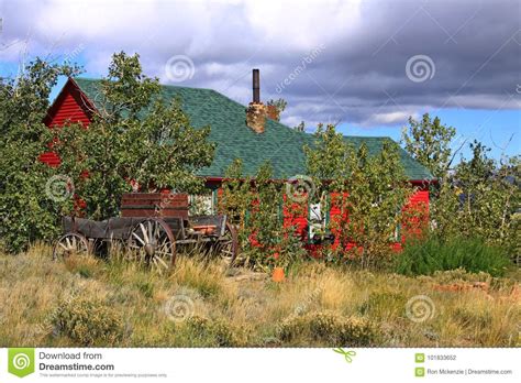 A small stream flows just below it. Cabin High Up In The Mountain Pass Stock Photo - Image of ...