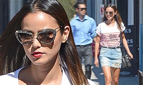 jamie chung puts on a leggy display in a ripped denim mini skirt in la daily mail online