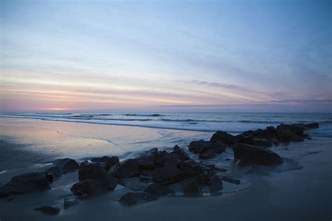 Folly Beach Sunrise Rocks Photograph By Alexander Fox Fine Art America