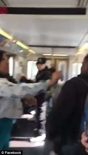 Woman Sprays Man In The Face During Altercation On A New York Subway Train Daily Mail Online