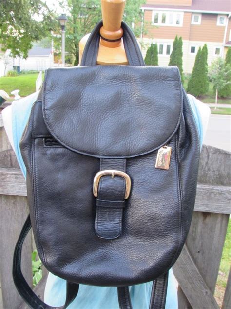 Tignanello Black Leather Backpack Gold Toned Buckles Hardware Bag Purse