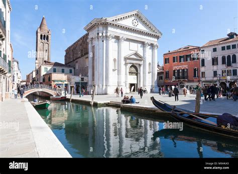 Campo San Barnaba With The Neoclassical Chiesa Di San Barnaba And Its Campanile Reflected In The