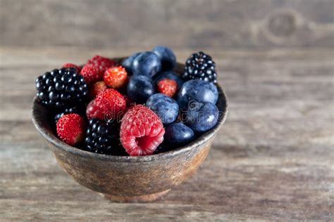 Assorted Berries In Bowl On Wood Stock Image Image Of Blackberry