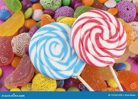 Colorful Lollipops And Different Colored Round Candy Stock Image